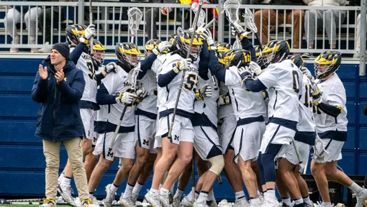 Men's lacrosse team huddle