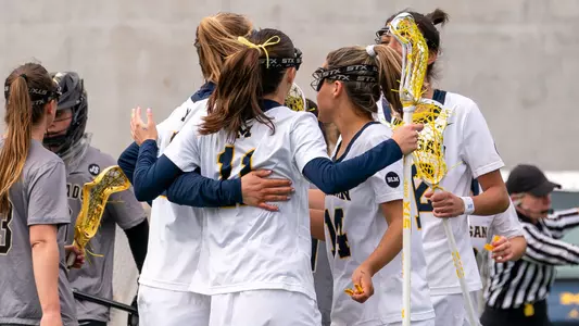 Women's lacrosse team celebration
