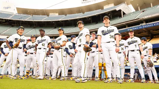 Baseball team pre-game away road white uniforms