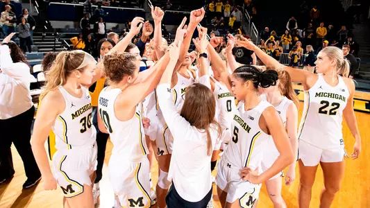 Women's Basketball Team Huddle