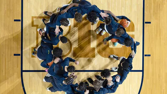 Men's basketball team huddle generic
