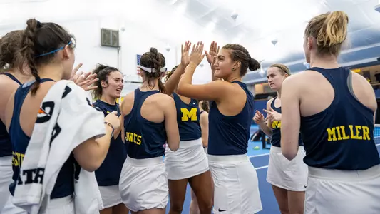 Women's Tennis team huddle