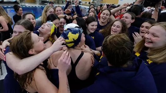 Women's Swimming and Diving Team Huddle