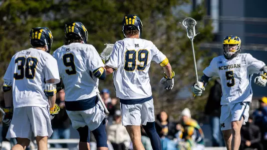 Men's lacrosse team celebration
