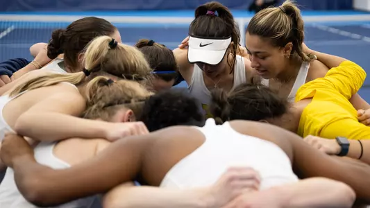 Women's tennis team huddle