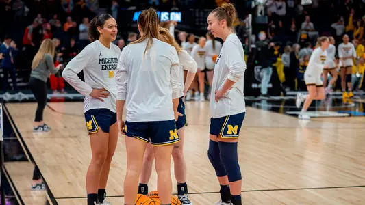 Women's Basketball Group Huddle