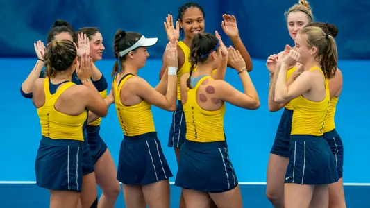 Women's Tennis Team Huddle