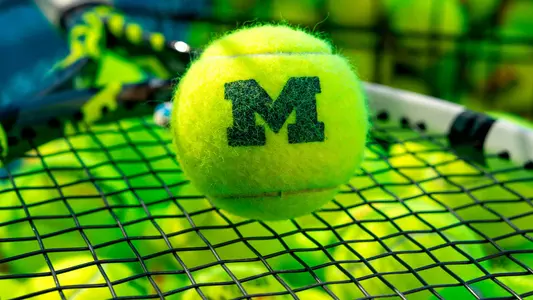 Women's Tennis Ball on Racket Generic