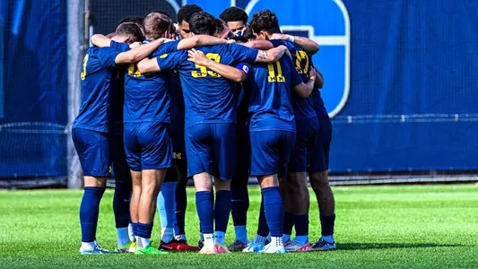 Men's Soccer Team Huddle