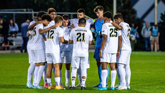 Men's Soccer Team Huddle