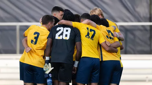 Men's Soccer Team Huddle
