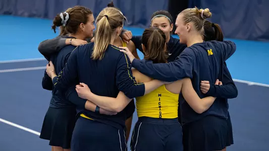 Women's tennis team huddle