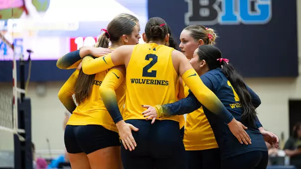 Michigan Volleyball huddle