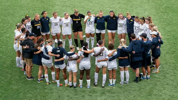 Women's Soccer Team Huddle