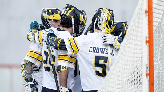 Men's lacrosse team huddle