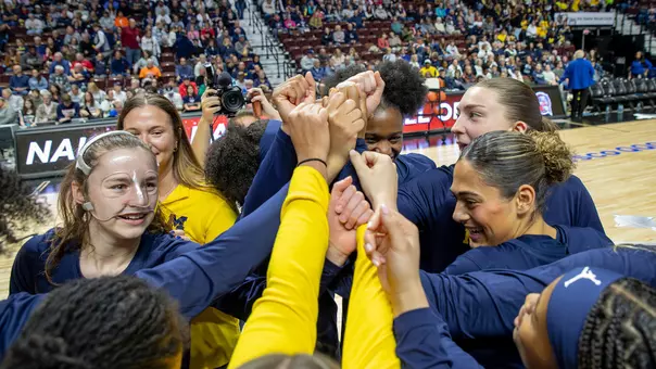 Women's basketball pregame huddle