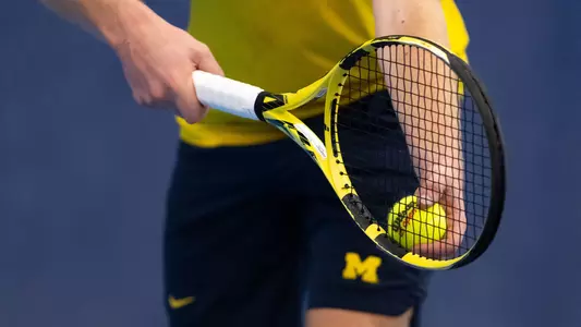 Men's Tennis Racket and Ball