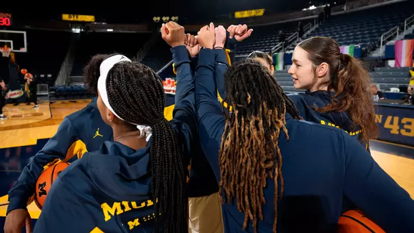 Women's Basketball Team Huddle