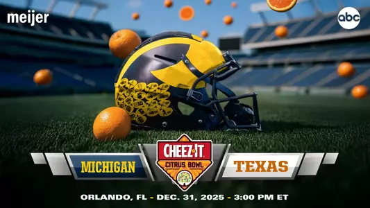 A Michigan football helmet on a field with oranges around it, promoting the Cheez-It Citrus Bowl matchup between Michigan and Texas on December 31, 2025 at 3 p.m.