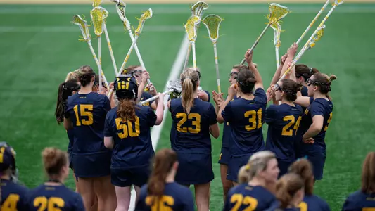 Women's lacrosse team huddle generic home