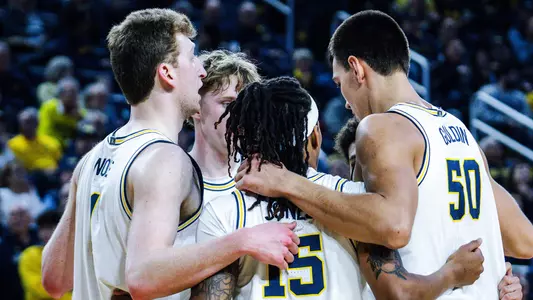 Michigan Men's Basketball huddle