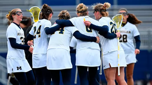 Women's Lacrosse Group Huddle