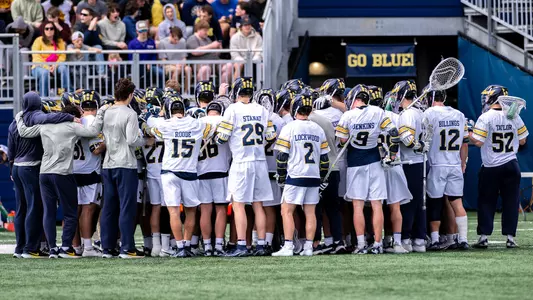Men's lacrosse team huddle