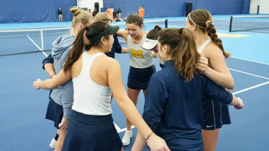 Women's tennis team huddle