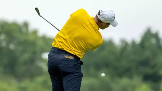 Men's Golf Swinging an Iron