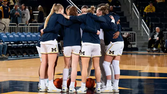 Women's Basketball Team Huddle