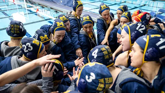 Michigan Water Polo huddle