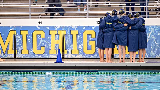 Michigan Water Polo huddle