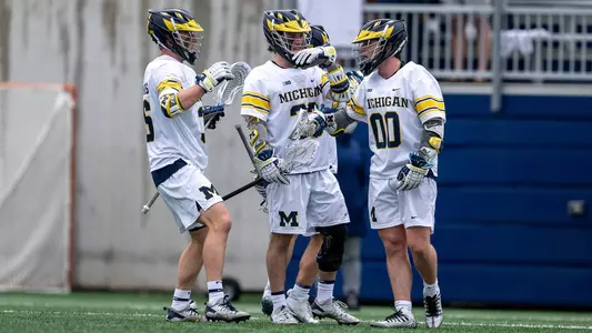 Men's Lacrosse Group Huddle