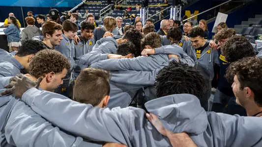 Michigan Men's Gymnastics Big Ten Event Finals huddle