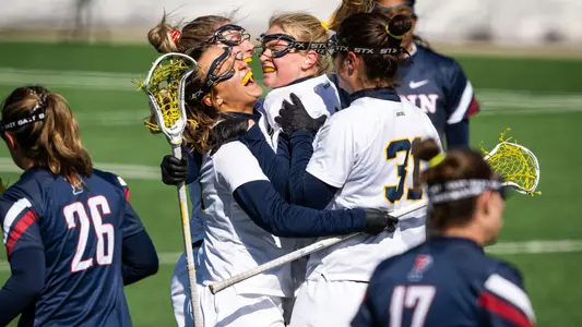 Michigan Women's Lacrosse huddle