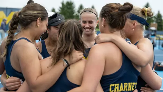 Women's tennis team huddle