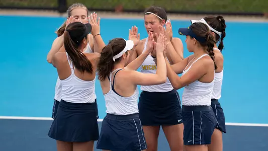 Women's tennis team huddle
