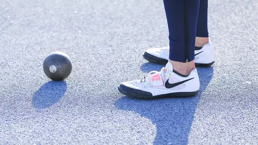 Track and Field Shot Put and Shoes