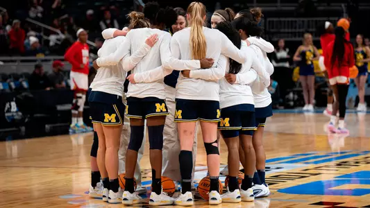 Women's Basketball Team Huddle