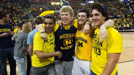 Men's Basketball Postgame Group Photo - Athletes Connected