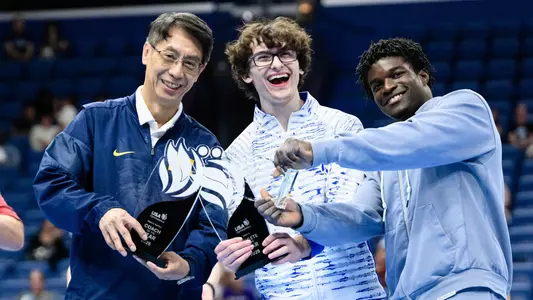 From left: Yuan Xiao, Stephen Nedoroscik and Fred Richard (USA Gymnastics)