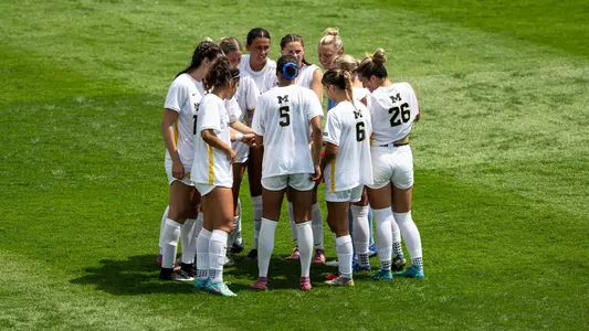 Women's Soccer Team Huddle