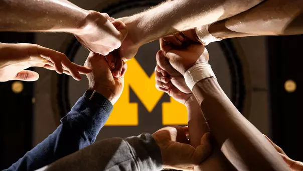 Men's Basketball Team Huddle