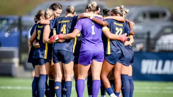 Women's Soccer Team Huddle