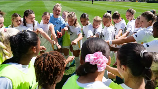 Women's Soccer Team Huddle