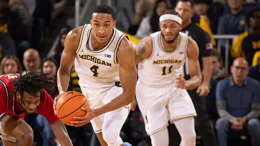 Nimari Burnett, foreground, and Roddy Gayle Jr.