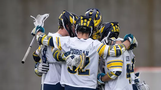 Men's lacrosse team huddle