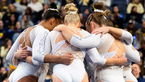 Women's Gymnastics Team Huddle
