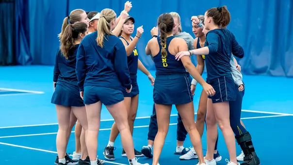 Women's Tennis Team Huddle