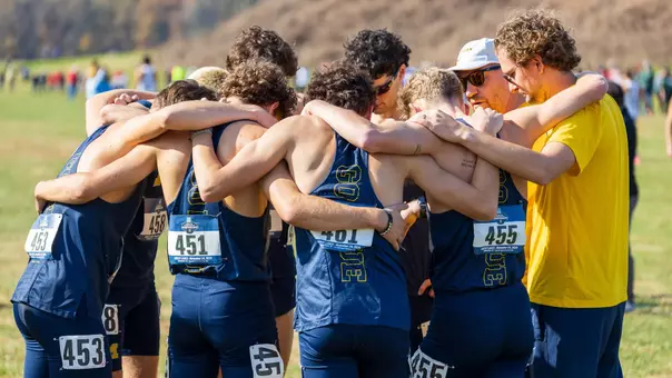 Men's Cross Country Team Huddle